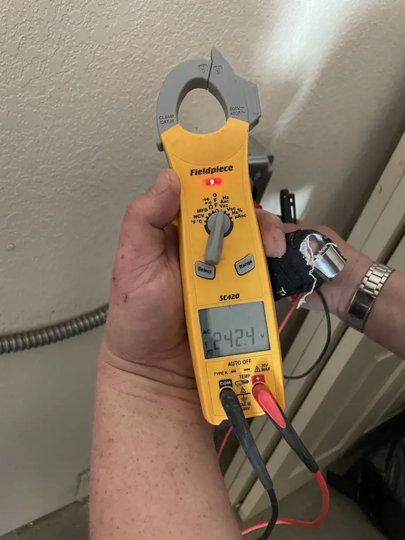 Voltage testing with clamp meter during Generator Installation in Sandston